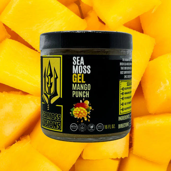 Sea moss gel container labeled 'Mango Punch' on a background of sliced mangoes.